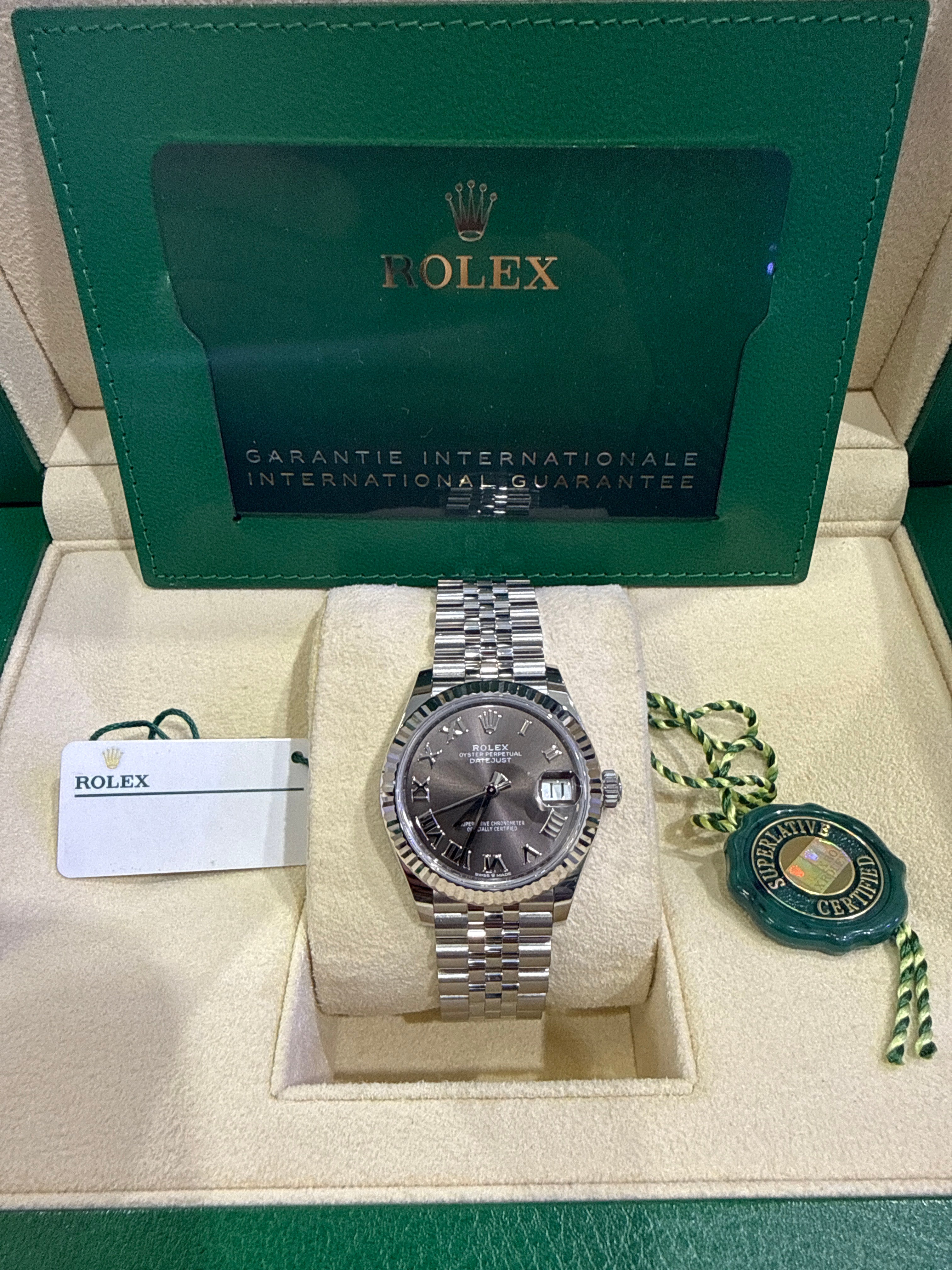Rolex Datejust 31mm – Ref: 278274-0022 – Dark Grey Sunray Roman Dial, Stainless Steel Jubilee Bracelet Women’s Pre-Owned Watch